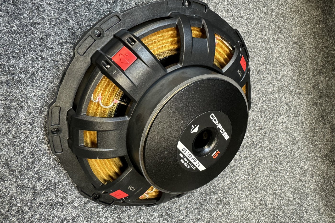 The back of a Helix Ci5 S200FM-D2 subwoofer, showing its cast basket and dual voice coils