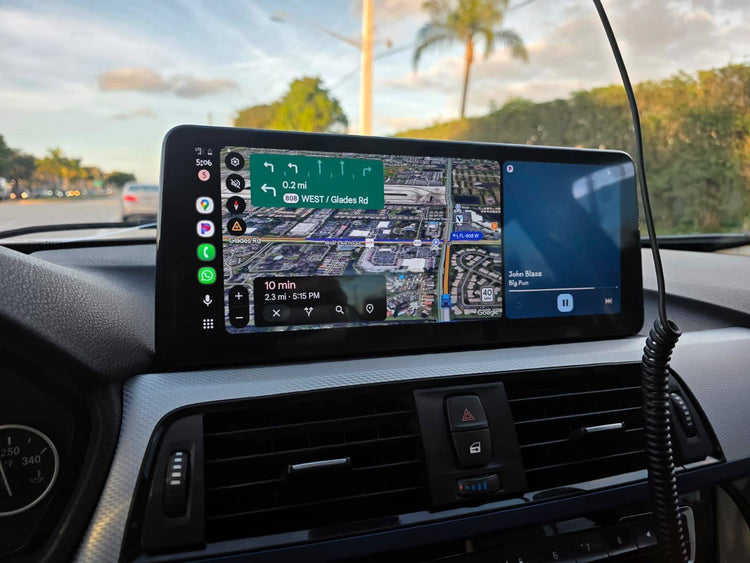 Wireless Android Auto navigation running on a BMW factory widescreen display