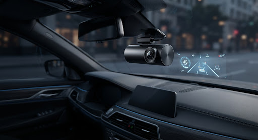 4K dash camera mounted on a luxury car windshield